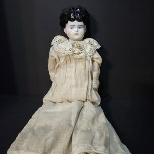 Antique Porcelain Doll with Lace Collar